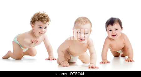 Babies group wearing diapers. Kids are crawling on floor. Stock Photo