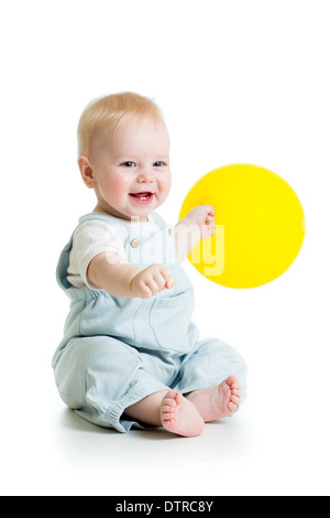 Happy baby boy with yellow ballon isolated on white Stock Photo