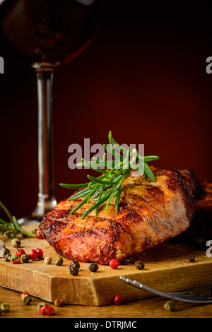 still life with grilled steak and glass of red wine Stock Photo