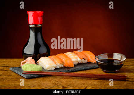 still life of mixed plate with nigiri sushi, soy sauce and chopsticks Stock Photo