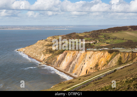 The multi-coloured Eocene sand cliffs of Alum Bay, Isle of Wight, from which sand layer tourist souvenirs are made Stock Photo