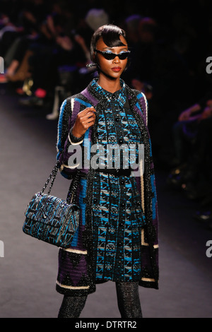 A model walks the runway at the Anna Sui fashion show during Mercedes-Benz Fashion Week Fall 2014 at Lincoln Center. Stock Photo