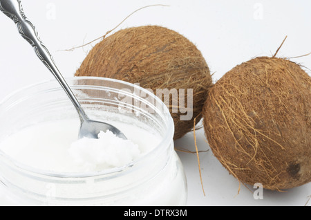 Coconut Oil with coconuts. Stock Photo