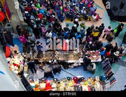 Overhead view of crowds of people at a shopping mall enjoying Chinese New Year's festivities in Vancouver, Canada. Stock Photo