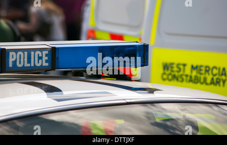 Blue light bar on top of a police car Stock Photo