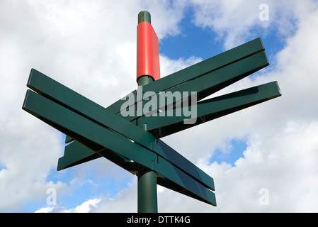 Blank Directional Sign Post on cloudy sky Stock Photo