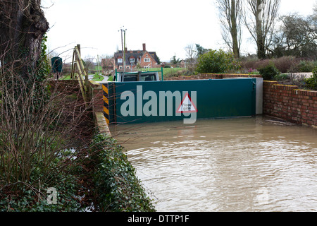 Flood defences holding back the River Severn at Deerhurst, near Tewkesbury, Gloucestershire UK - February 2014 Stock Photo