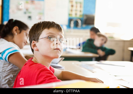 Caucasian student sitting in class Stock Photo