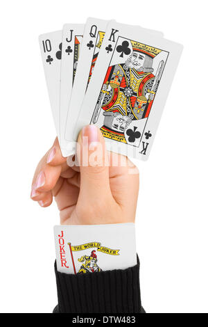 Hand and joker in sleeve Stock Photo