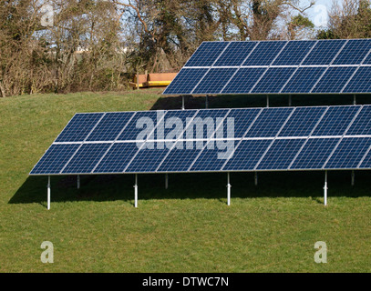 Solar panels in farmers field, Cornwall, UK Stock Photo