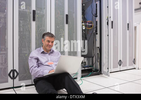 Technician working on the floor Stock Photo