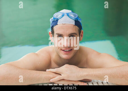 Happy man in the swimming pool Stock Photo