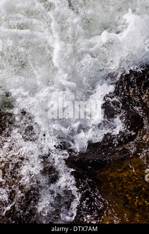 Whitewater rapids close-up, the Arkansas RIver runs through the downtown historic district of the mountain town of Salida, CO Stock Photo