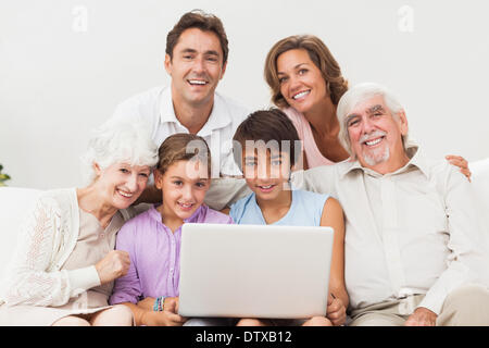 Multigeneration family on couch Stock Photo
