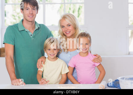 Smiling family baking Stock Photo
