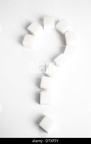 Sugar cubes in shape of question mark Stock Photo