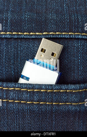 Flash memory in jeans pocket Stock Photo