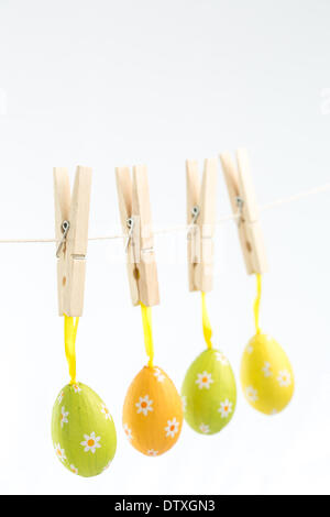 Easter eggs hanging from a line Stock Photo
