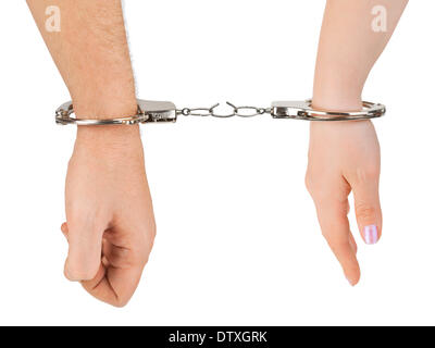 Man and woman hands and breaking handcuffs Stock Photo