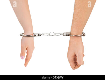 Man and woman hands and breaking handcuffs Stock Photo