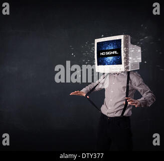 Man with a monitor head, no signal sign on the display Stock Photo