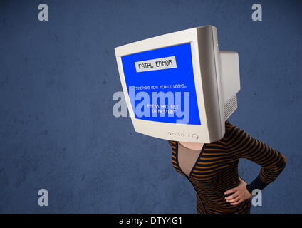 Person with a monitor head and fatal error blue screen on the display Stock Photo