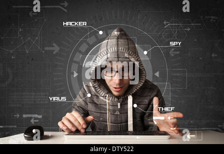 Young hacker in futuristic enviroment hacking personal information Stock Photo