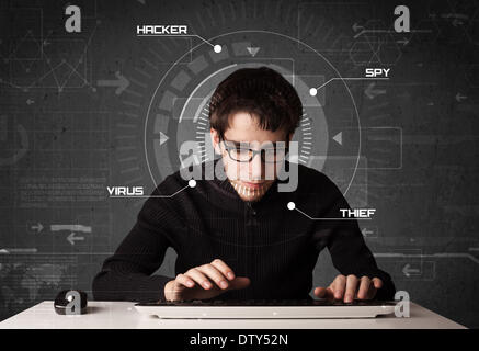 Young hacker in futuristic enviroment hacking personal information Stock Photo