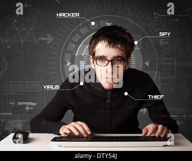 Young hacker in futuristic enviroment hacking personal information Stock Photo