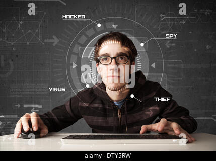 Young hacker in futuristic enviroment hacking personal information Stock Photo