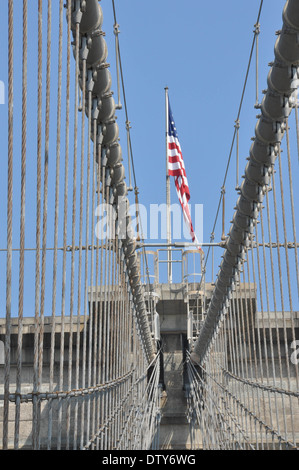 New York,USA  - June 28, 2011 : American flag on the Brooklyn Bridge Stock Photo