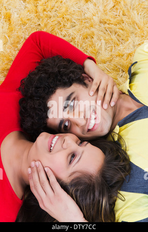 friend carefee and lying down at home Stock Photo