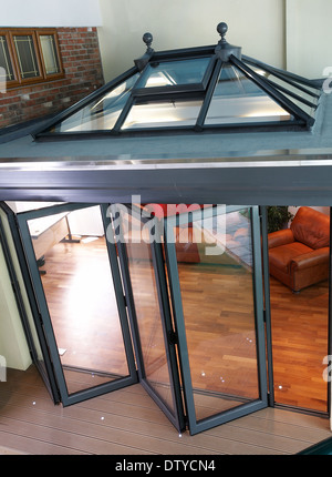 A series of images showing folding doors and skylight on an orangery type conservatory in a showroom in England, UK. Stock Photo