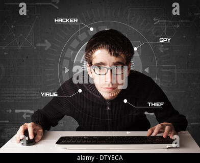 Young hacker in futuristic enviroment hacking personal information Stock Photo