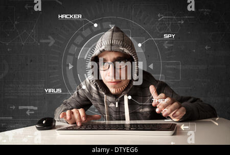 Young hacker in futuristic enviroment hacking personal information Stock Photo