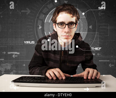 Young hacker in futuristic enviroment hacking personal information Stock Photo