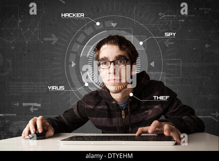 Young hacker in futuristic enviroment hacking personal information Stock Photo