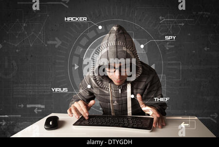 Young hacker in futuristic enviroment hacking personal information Stock Photo