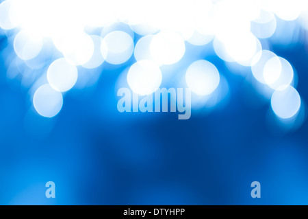 Magical blue abstract background with blurred defocused sparkles and bokeh Stock Photo