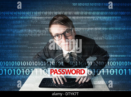 Young geek hacker stealing password Stock Photo
