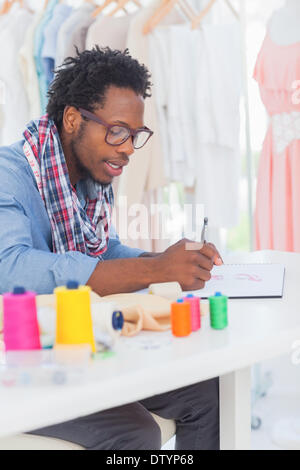Fashion designer sketching Stock Photo