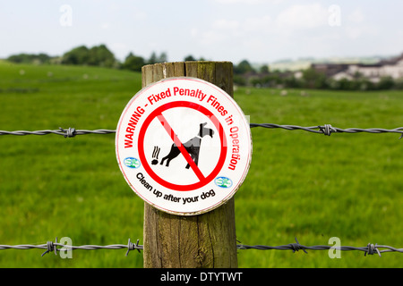 fixed penalty fines in operation for dog fouling Clean up after your dog sign Stock Photo