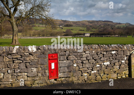 A red GR (George V) post box in a wall at Monsal Head in the Peak District National Park, Derbyshire UK. Stock Photo