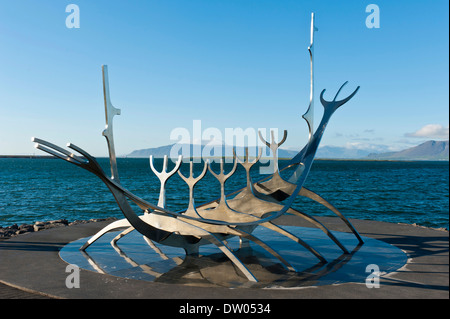 The Sun Voyager Sculpture or Sólfar Sculpture by artist Jón Gunnar Árnason, a Viking ship made of stainless steel, Reykjavík Stock Photo