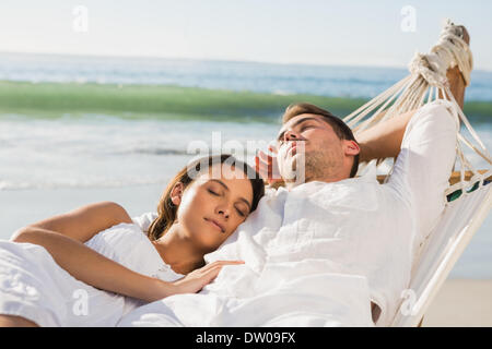 Peaceful couple napping in a hammock Stock Photo