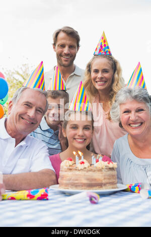 Happy extended family at birthday party Stock Photo