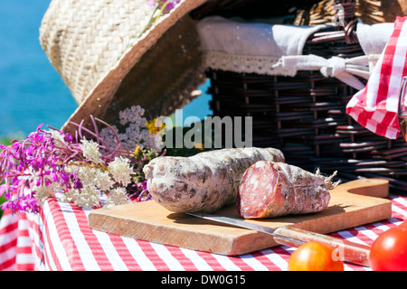 Picnic in french alps with salami Stock Photo