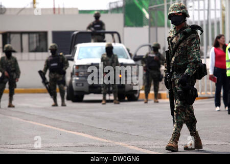 Mexico City, Mexico. 22nd Feb, 2014. A Mexican Navy soldier guards a street in Mazatlan, Sinaloa, Mexico, on Feb. 22, 2014. The head of Mexico's Sinaloa Cartel Joaquin Guzman Loera, alias as ''El Chapo Guzman'' who is considered by the United States as one of the most powerful drug lords in the world, was captured by Mexican and U.S. authorities in Mexican territory, according to local press. © Jair Cabrera Torres/NurPhoto/ZUMAPRESS.com/Alamy Live News Stock Photo