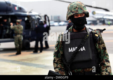 Mexico City, Mexico. 22nd Feb, 2014. A Mexican Navy soldier guards a street in Mazatlan, Sinaloa, Mexico, on Feb. 22, 2014. The head of Mexico's Sinaloa Cartel Joaquin Guzman Loera, alias as ''El Chapo Guzman'' who is considered by the United States as one of the most powerful drug lords in the world, was captured by Mexican and U.S. authorities in Mexican territory, according to local press. © Jair Cabrera Torres/NurPhoto/ZUMAPRESS.com/Alamy Live News Stock Photo