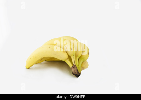 A bunch of ripe whole bananas isolated on a white background. Cutout, cut out. Stock Photo